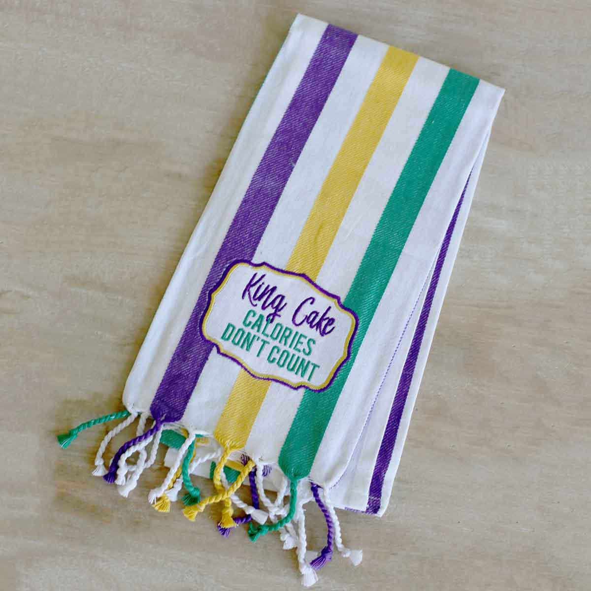 KING CAKE STRIPE HAND TOWEL