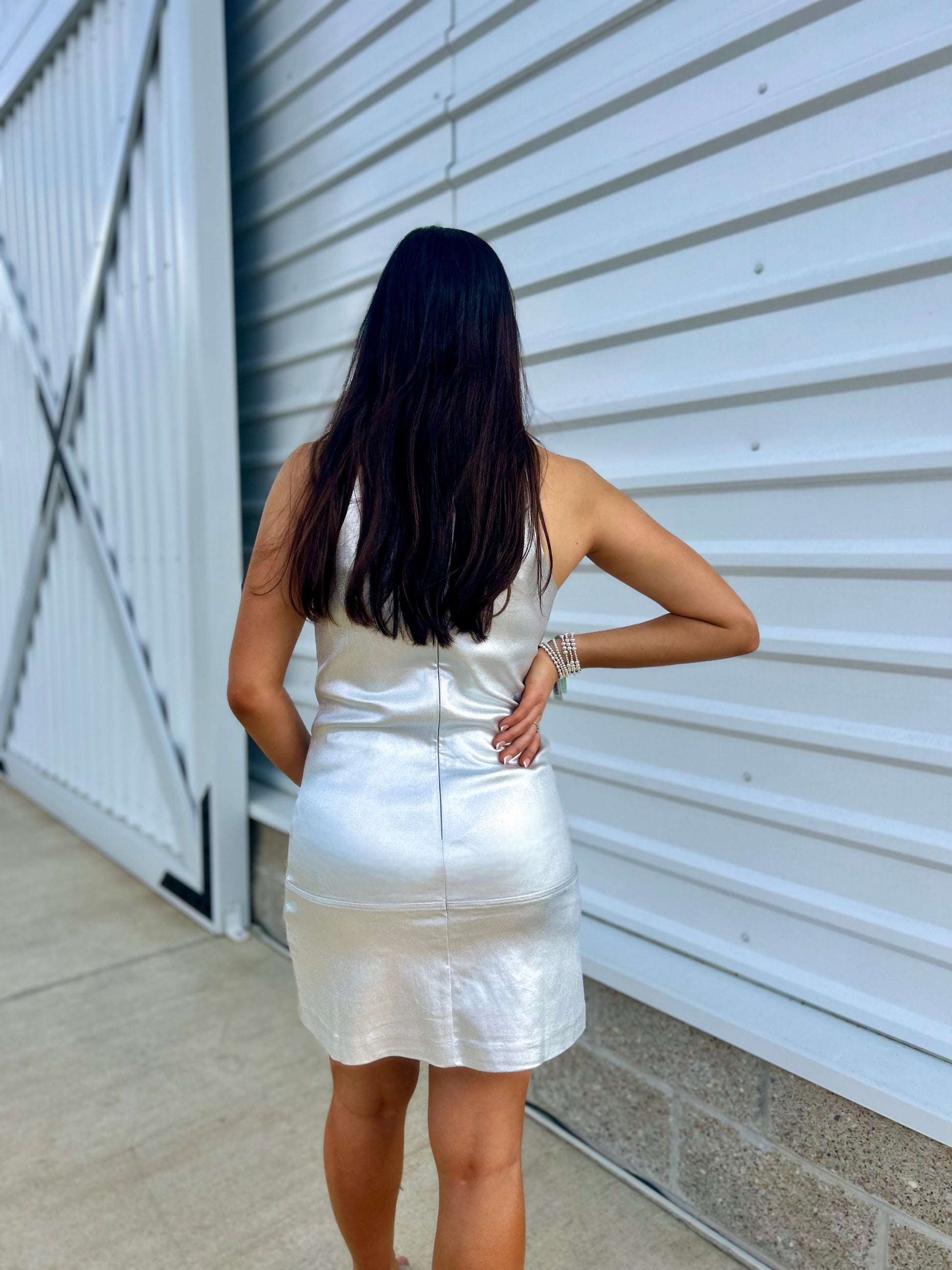 kasey mini dress Dressed to impress (and sparkle) The Kasey Diamonte Dress is that one piece you'll keep reaching for. A charming mini dress with petal sleeves, beaded trim, a sleek shift silhouette, and